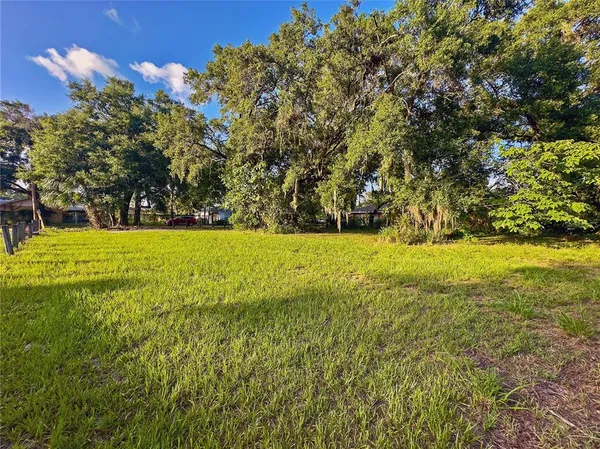 a view of an outdoor space and a yard