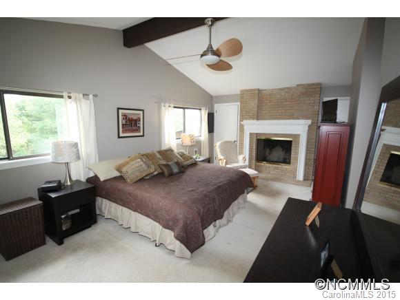 1201 New Market Road Tryon, NC 28782 - Photo 11 of 19 a living room with furniture and a fireplace