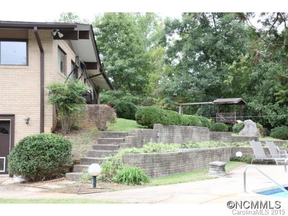 1201 New Market Road Tryon, NC 28782 - Photo 16 of 19 a view of backyard with outdoor seating