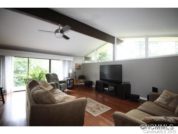1201 New Market Road Tryon, NC 28782 - Photo 5 of 19 a living room with furniture and a flat screen tv