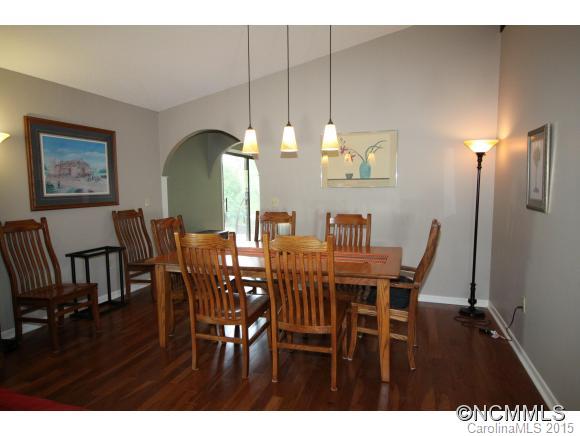 1201 New Market Road Tryon, NC 28782 - Photo 7 of 19 a view of a dining room with furniture and wooden floor