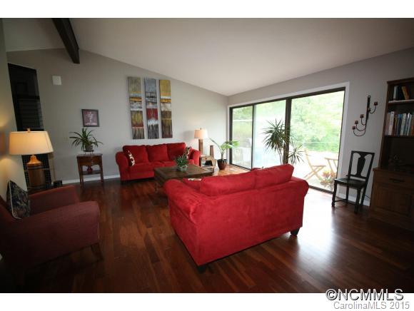 1201 New Market Road Tryon, NC 28782 - Photo 10 of 19 a living room with furniture and a large window