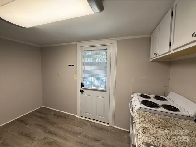 a view of storage and utility room with washer and dryer