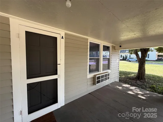 a view of front door with outdoor space