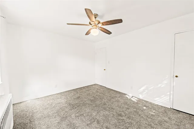 a view of a room with a window