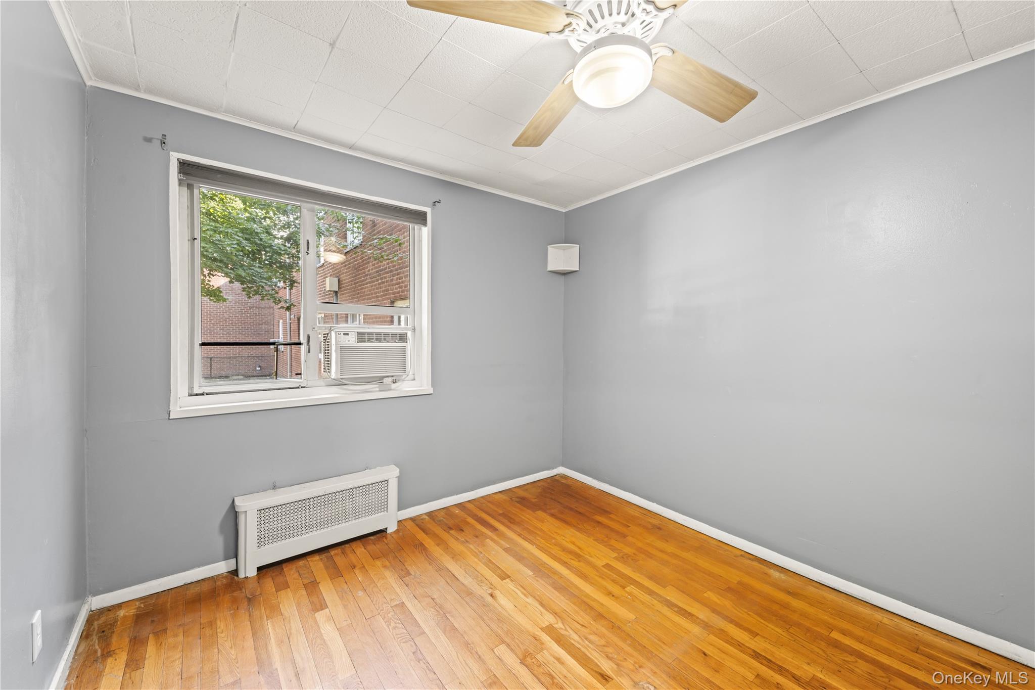 225-35 88th Avenue, Unit LOWR Queens, NY 11427 - Photo 6 of 15 a view of a room with a window