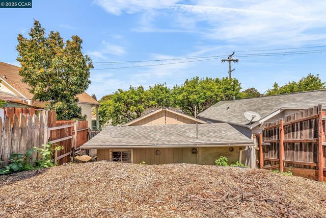 a view of a house with a door and wooden floor