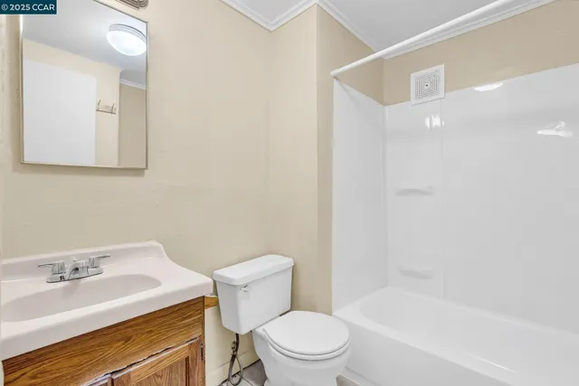 a view of a livingroom with wooden floor