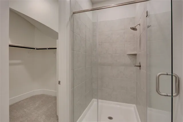 a view of a hallway with a chandelier