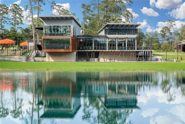 a group of people sitting in a living room