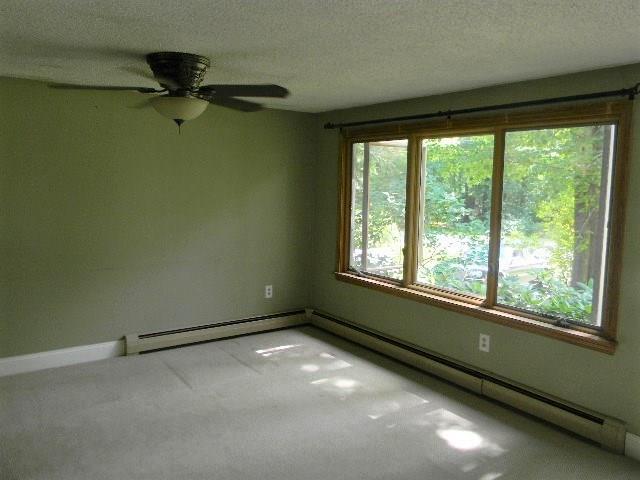 26 Keith Street Chelsea, ME 04330 - Photo 5 of 25 Another angle of spacious living room