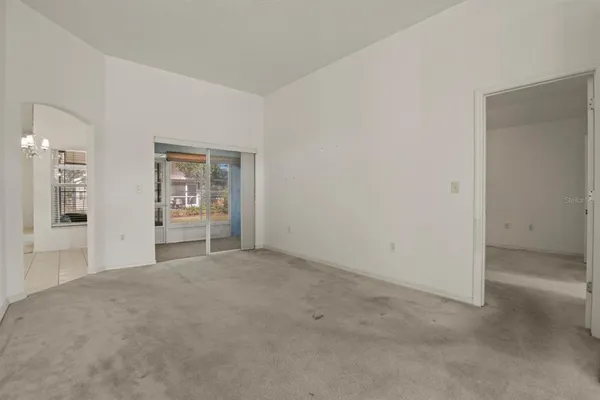 an empty room with a bathroom