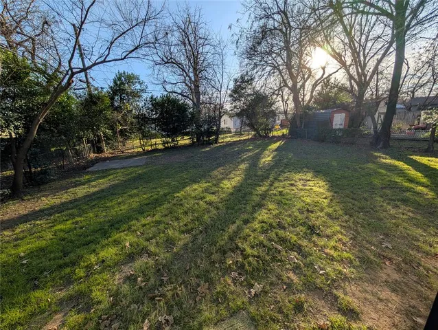a view of yard with trees