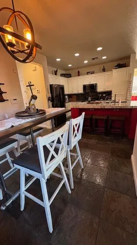 a bathroom with a toilet a sink and bathtub