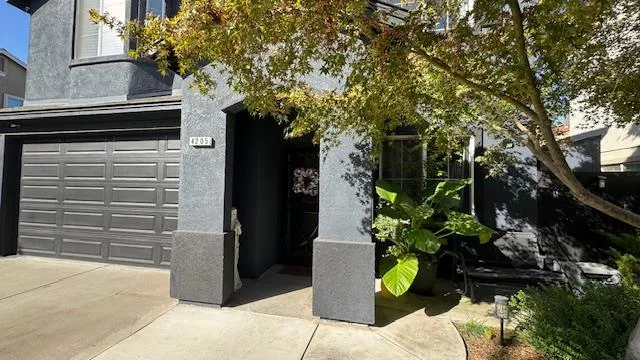a kitchen with stainless steel appliances granite countertop a sink stove and wooden cabinets