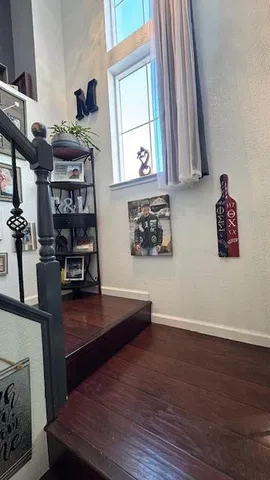 a bathroom with a shower and a sink