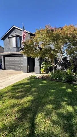 a kitchen with furniture a counter top space stainless steel appliances and cabinets