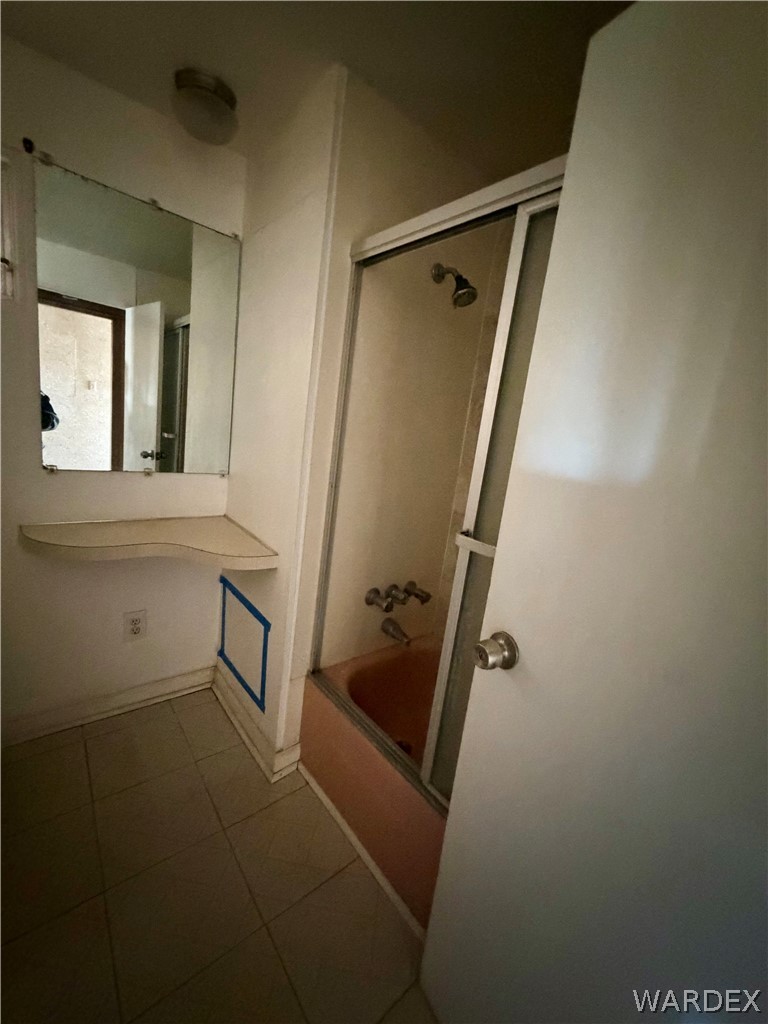 4360 Smoketree Road Golden Valley, AZ 86413 - Photo 12 of 20 a bathroom with a shower and a mirror
