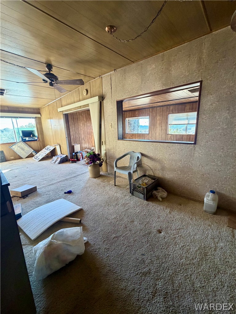 4360 Smoketree Road Golden Valley, AZ 86413 - Photo 13 of 20 a room with furniture and windows