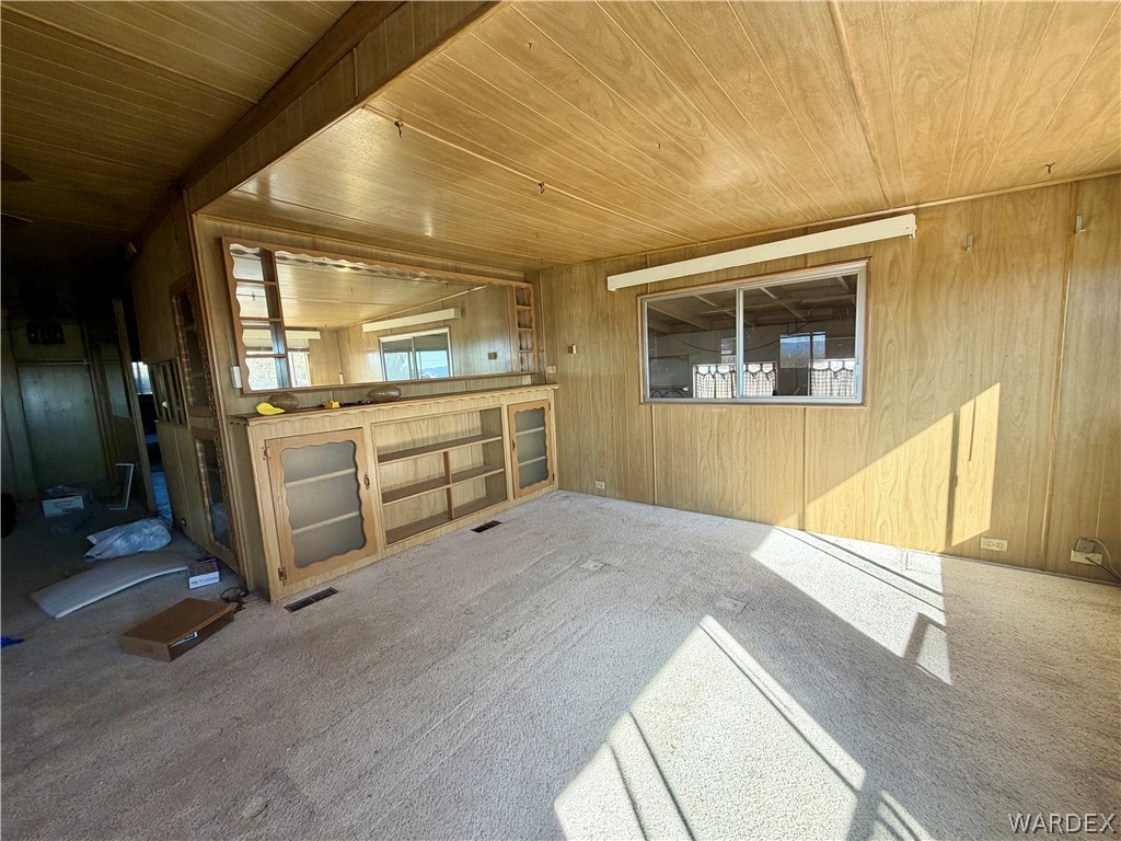 4360 Smoketree Road Golden Valley, AZ 86413 - Photo 7 of 20 a view of an empty room and window