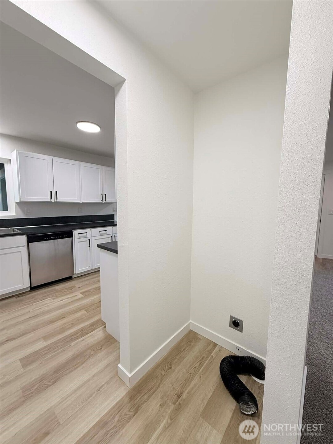 1807 Harding Road Aberdeen, WA 98520 - Photo 15 of 29 a view of kitchen with wooden floor and electronic appliances