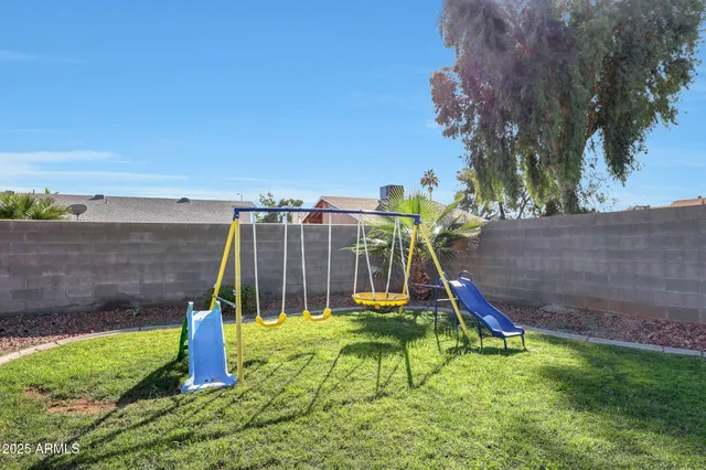 a view of a park with a slide