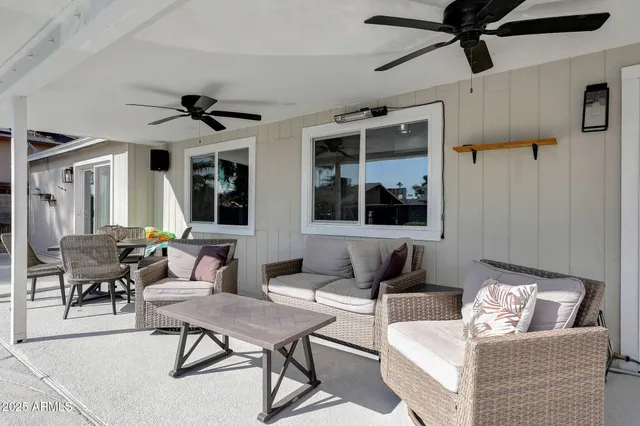 a living room with furniture and a window