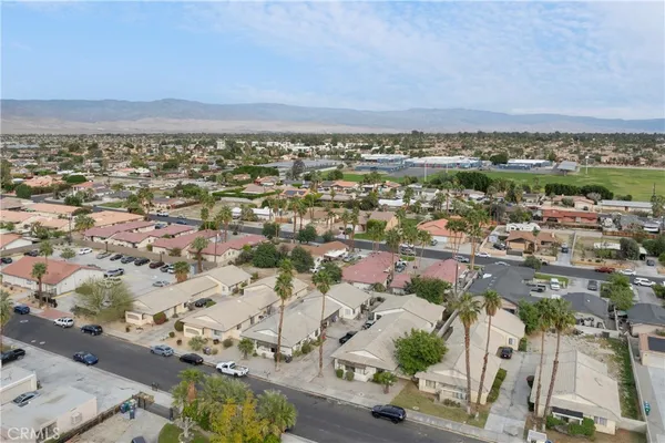 an aerial view of a city with lots of residential buildings