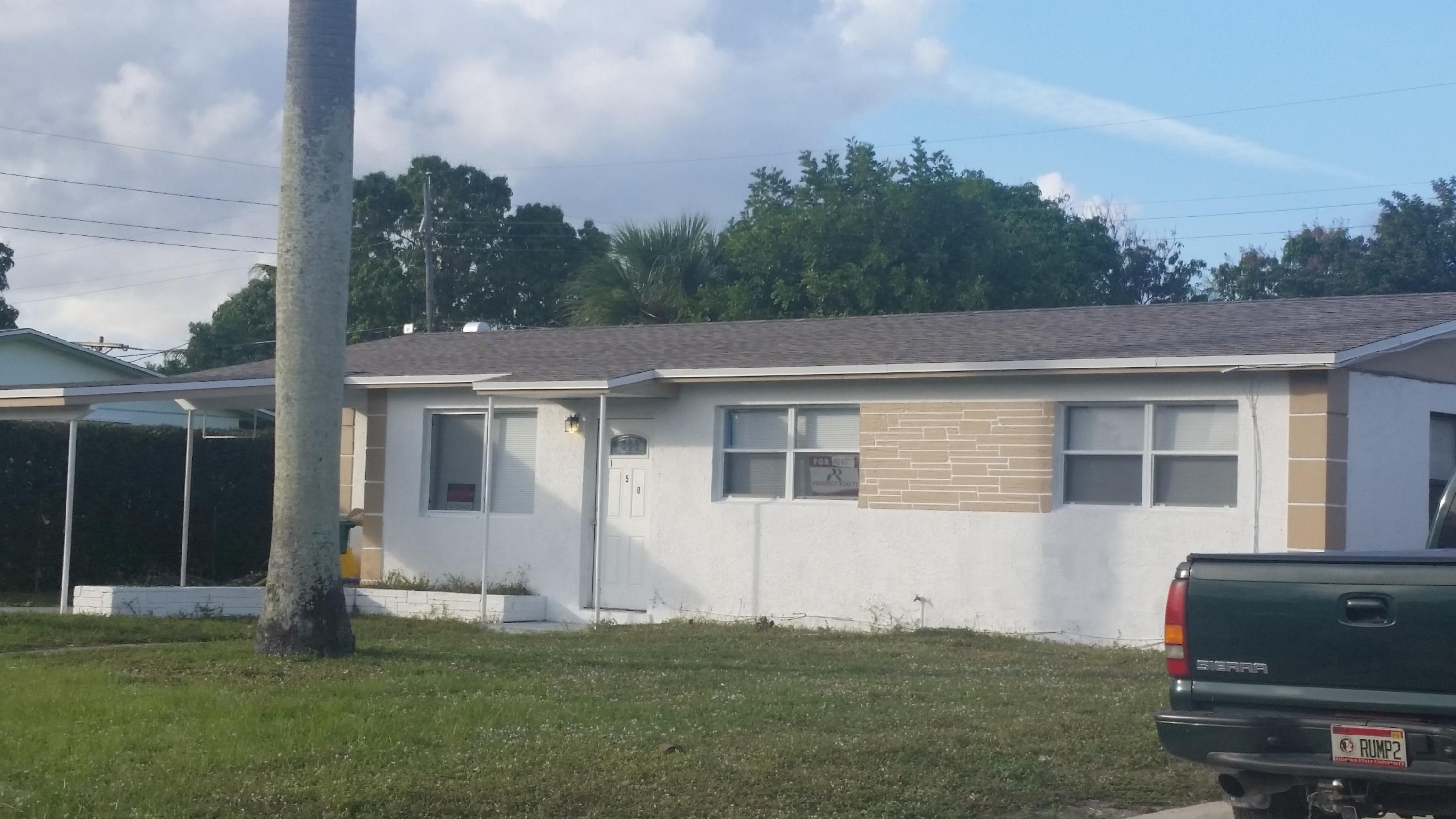 150 West 31st Court Riviera Beach, FL 33404 - Photo 4 of 12 ExterFront