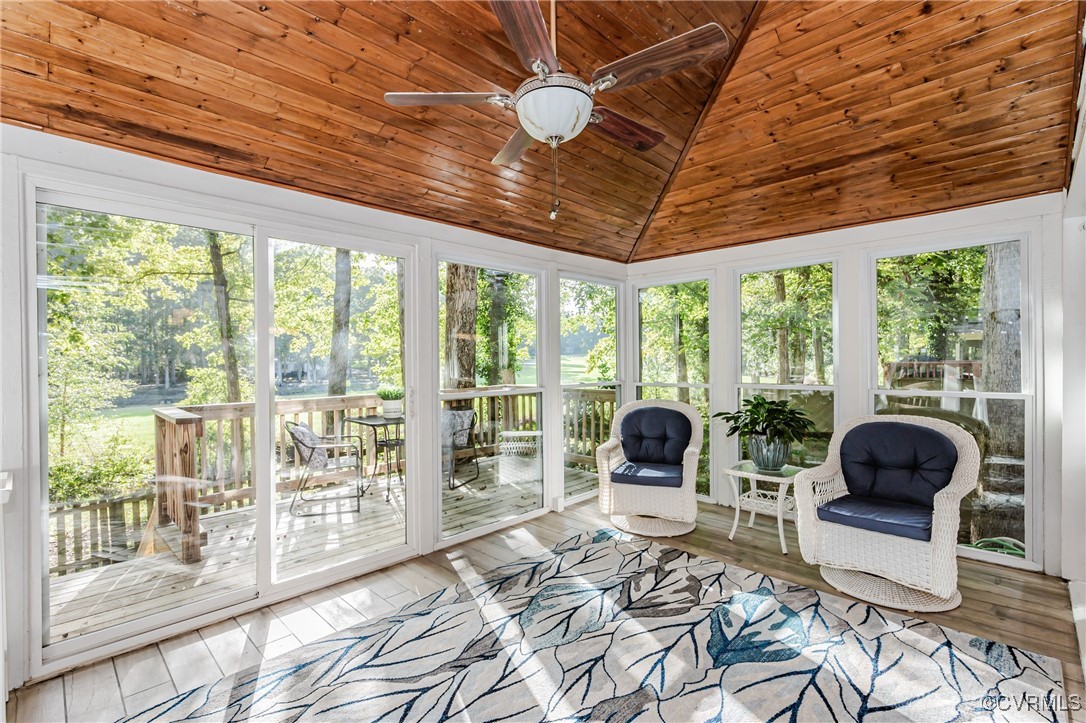 3100 3 Bridges Road Midlothian, VA 23112 - Photo 11 of 48 a living room with furniture and floor to ceiling windows