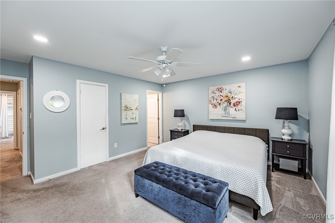 3100 3 Bridges Road Midlothian, VA 23112 - Photo 22 of 48 a bedroom with a bed and a chandelier