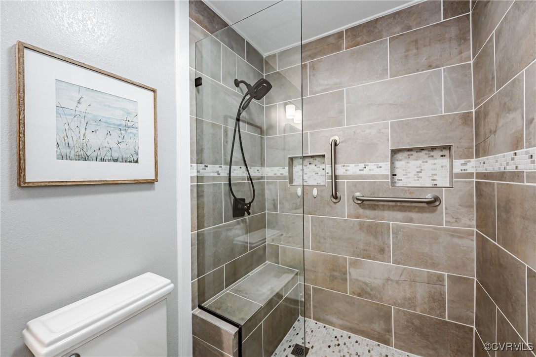 3100 3 Bridges Road Midlothian, VA 23112 - Photo 25 of 48 a bathroom with a shower and toilet