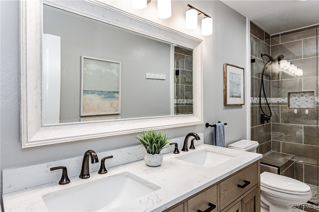 3100 3 Bridges Road Midlothian, VA 23112 - Photo 26 of 48 a bathroom with a sink and a mirror