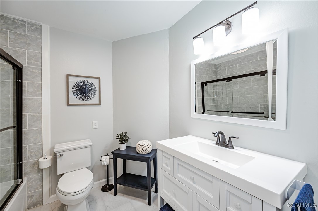 3100 3 Bridges Road Midlothian, VA 23112 - Photo 30 of 48 a bathroom with a toilet a sink and mirror