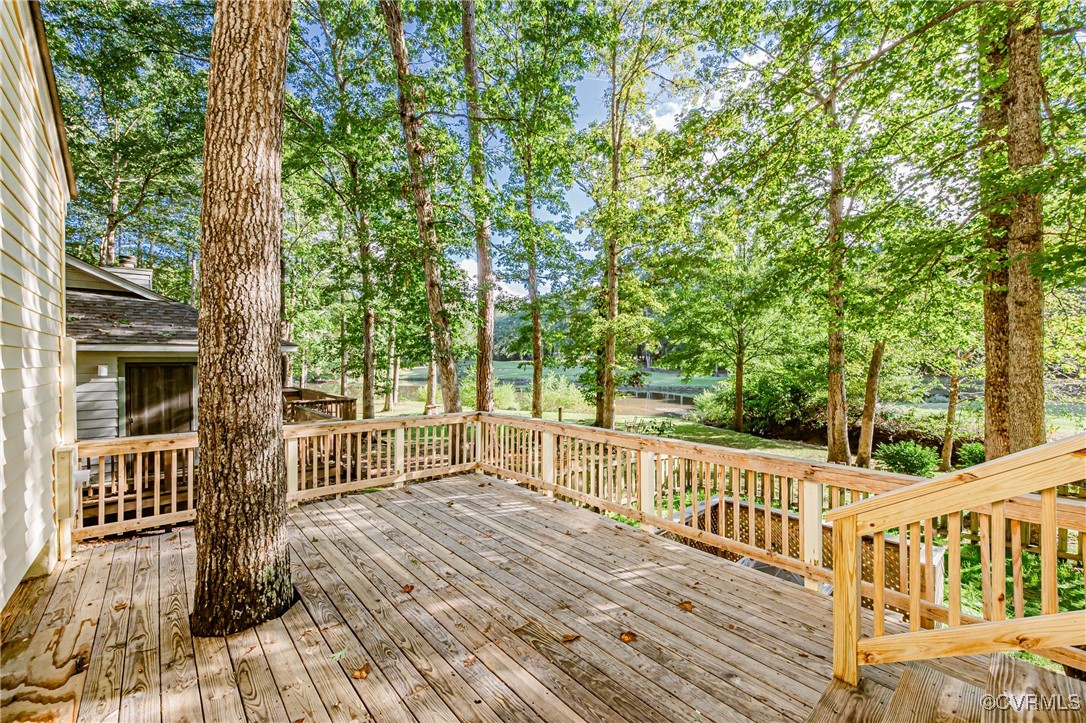 3100 3 Bridges Road Midlothian, VA 23112 - Photo 35 of 48 a view of a house with backyard and deck