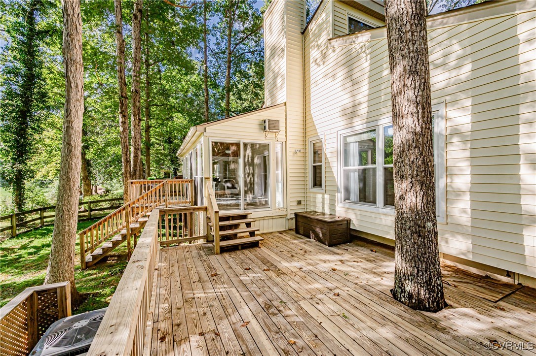 3100 3 Bridges Road Midlothian, VA 23112 - Photo 36 of 48 a view of balcony with couch and wooden floor