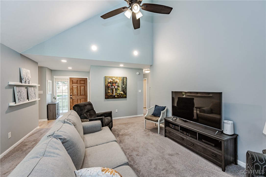 3100 3 Bridges Road Midlothian, VA 23112 - Photo 8 of 48 a living room with furniture and a flat screen tv
