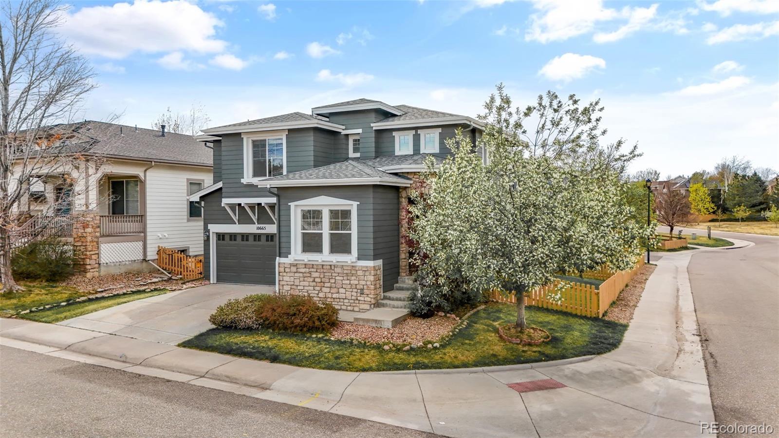 10665 Evondale Street Highlands Ranch, CO 80126 - Photo 2 of 45 a view of a house with entertaining space