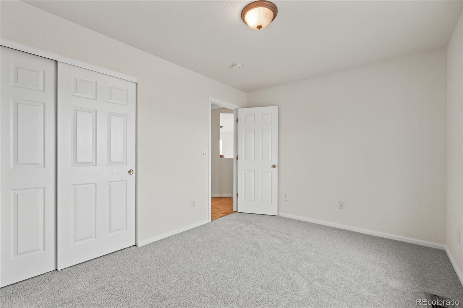 10665 Evondale Street Highlands Ranch, CO 80126 - Photo 28 of 45 a view of an empty room