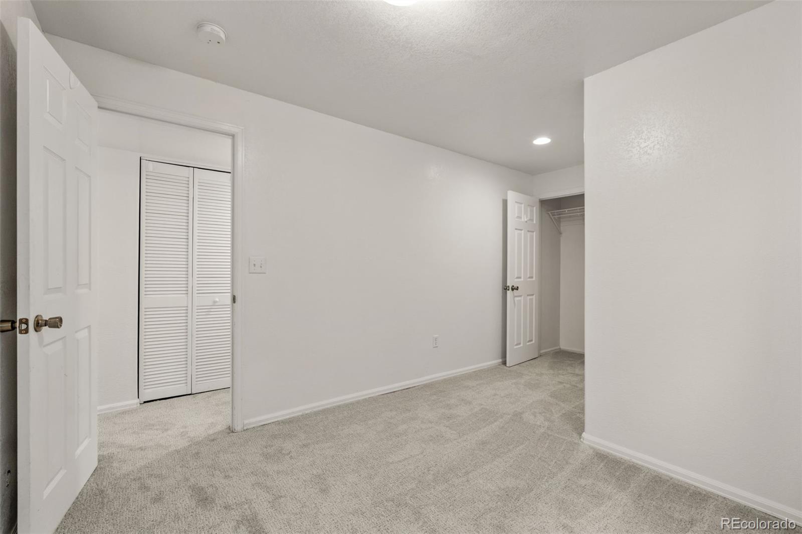 10665 Evondale Street Highlands Ranch, CO 80126 - Photo 34 of 45 a view of an empty room and closet area