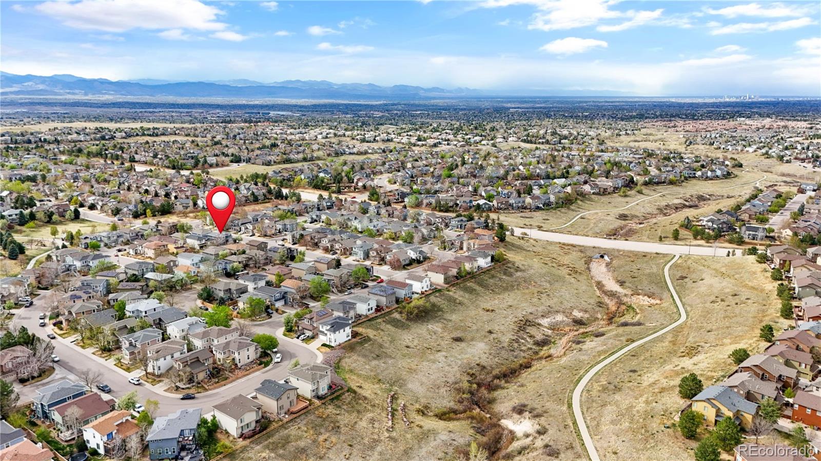 10665 Evondale Street Highlands Ranch, CO 80126 - Photo 40 of 45 an aerial view of a city