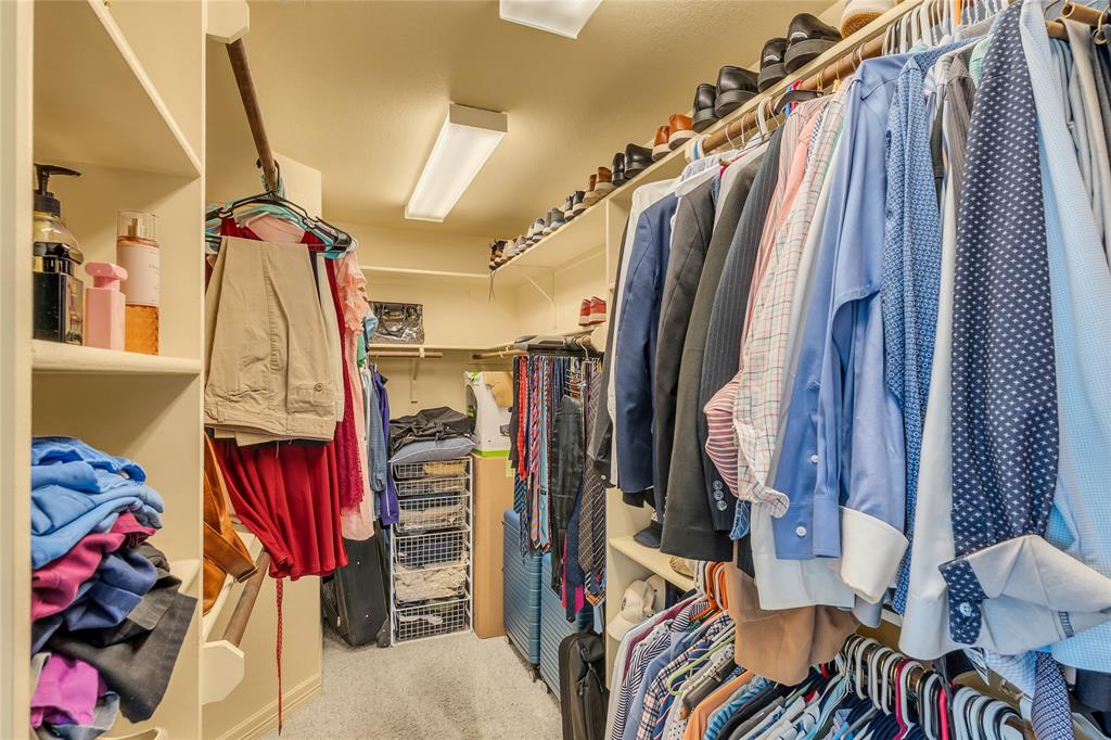 5613 Landsdown Drive Waco, TX 76708 - Photo 18 of 27 a view of walk in closet with clothes