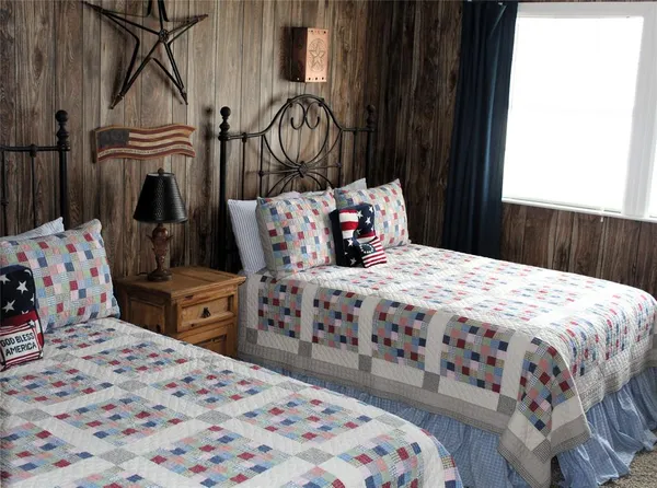 a bedroom with a bed and a closet