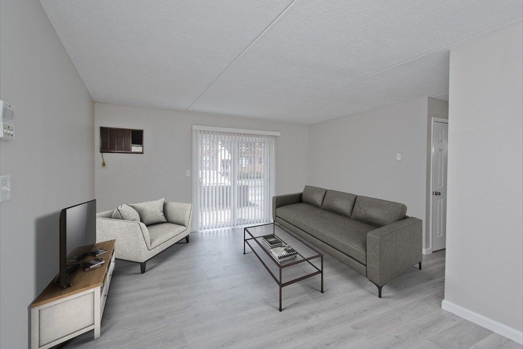 34 Maple Crest Circle, Unit D Holyoke, MA 01040 - Photo 1 of 22 a living room with furniture and a flat screen tv