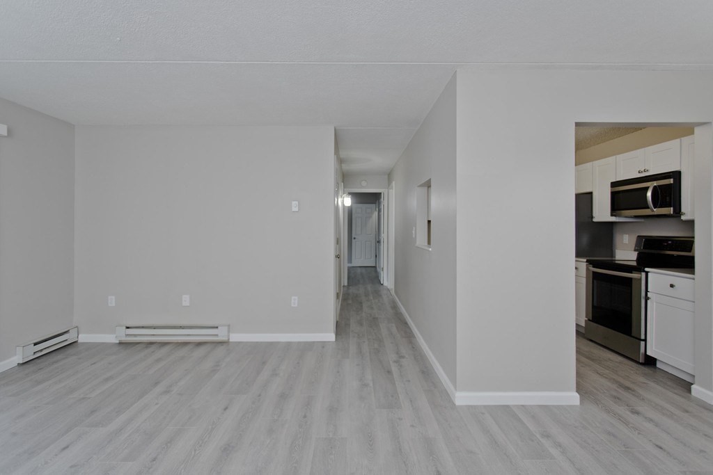 34 Maple Crest Circle, Unit D Holyoke, MA 01040 - Photo 7 of 22 a view of a kitchen from the hallway