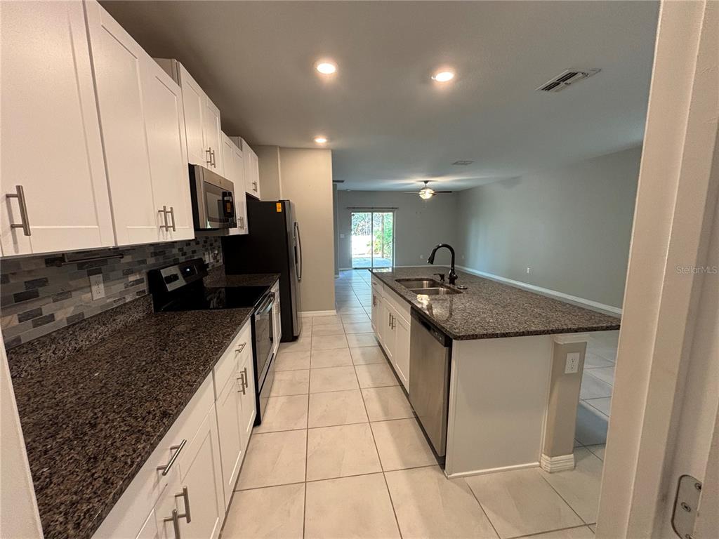 572 Argyll Dr Spring Hill Spring Hill, FL 34609 - Photo 7 of 25