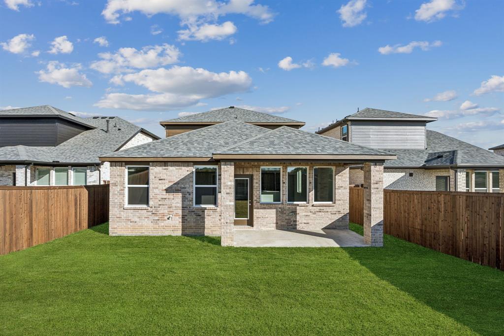 425 Magellan Road Seagoville, TX 75159 - Photo 16 of 36 front view of a house with a yard