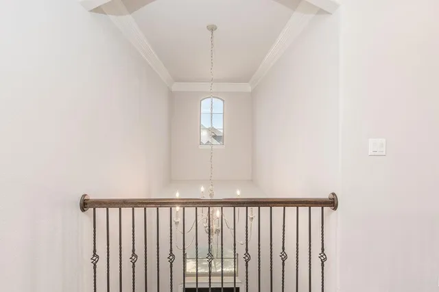 a view of a hallway with windows