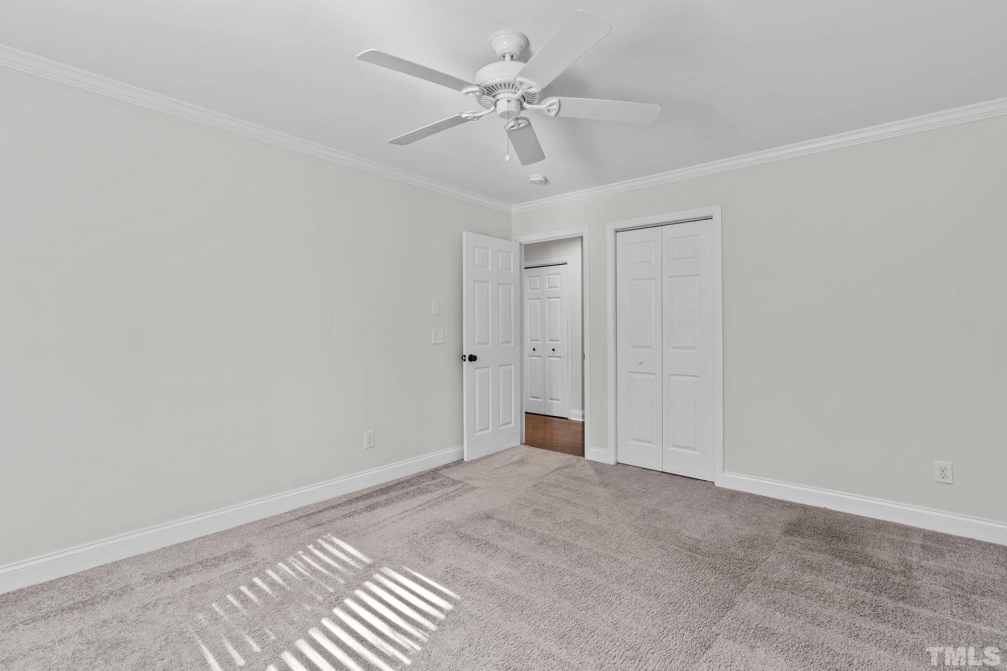 4505 Edwards Mill Road, Unit G Raleigh, NC 27612 - Photo 24 of 31 a view of an empty room