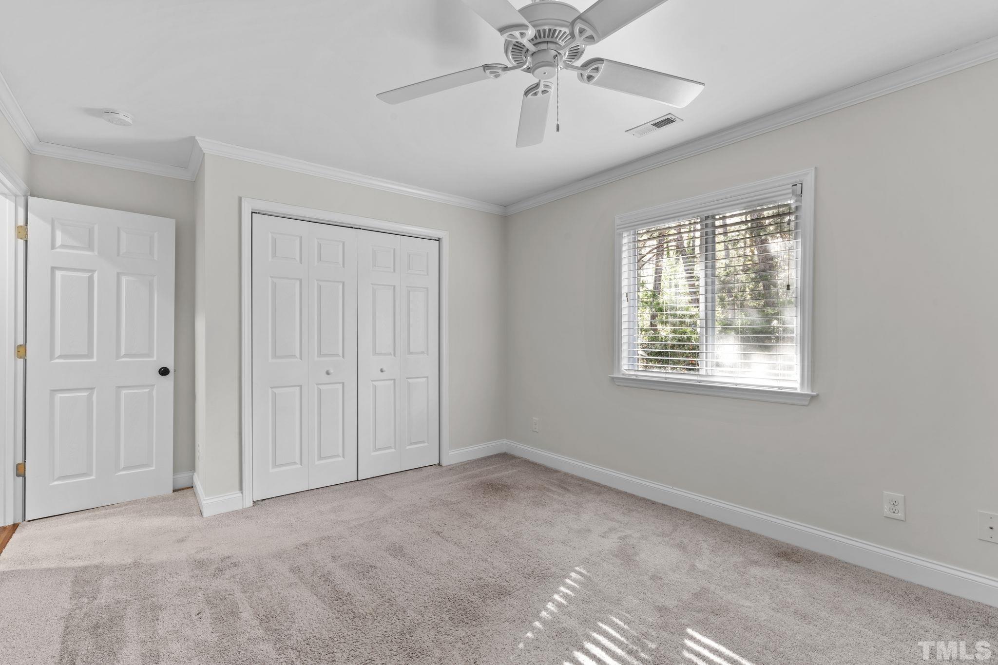 4505 Edwards Mill Road, Unit G Raleigh, NC 27612 - Photo 26 of 31 a view of an empty room with a window